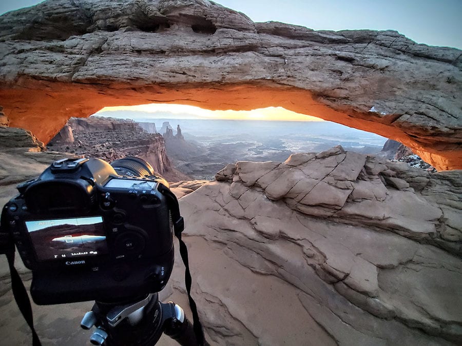 image of camera in live view photographing mesa arch in Utah