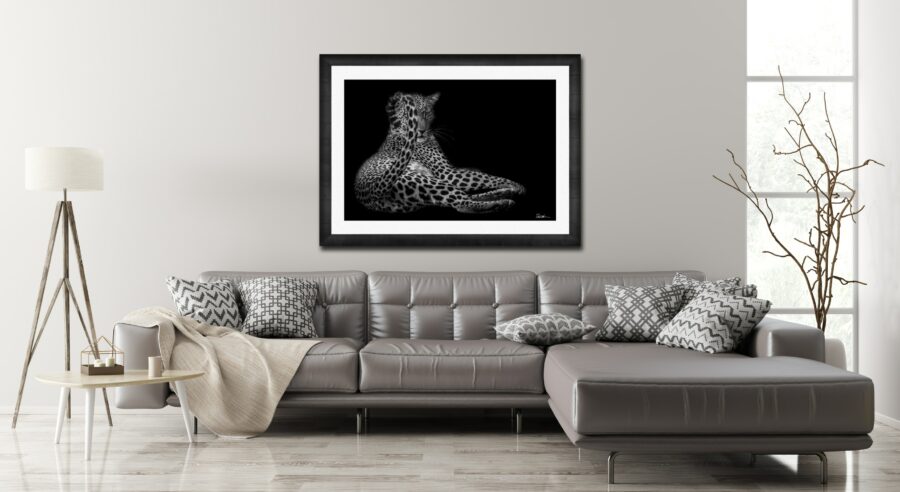 large fine art print of a leopard displayed on the wall of a luxury home