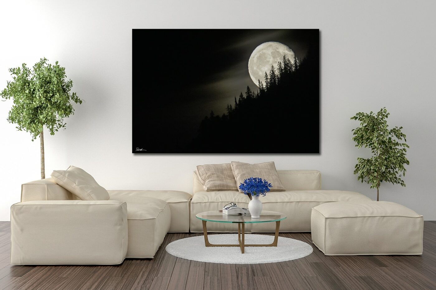 Fine art photographic print of a full moon rising in yellowstone national park displayed in a living room