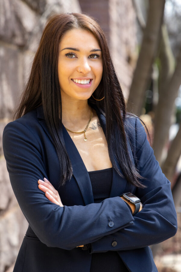 beautiful woman wearing a sport coat for a business photo shoot