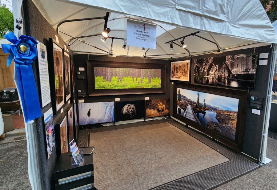 image of Derek Nielsen Photography's booth in the Old Town Art Fair a place to sell photography for artist around the world