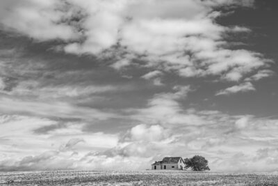 image of a lonely old barn on the Great Plains in black and white