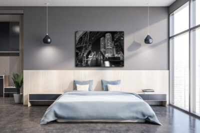 fine art print of the city of Chicago in black and white displayed in a bedroom of a luxury condo