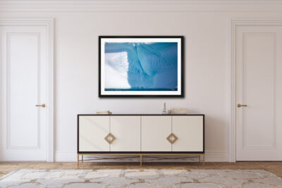 framed fine art photo of sea ice displayed in a modern home