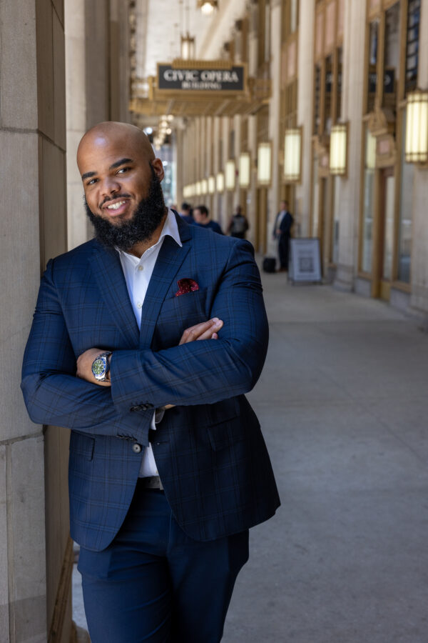 personal brand photography shoot with a handsome man in a blue suit