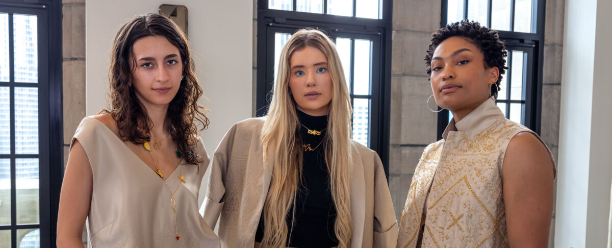 three beautiful women modeling for a fashion shoot adding to their personal brand