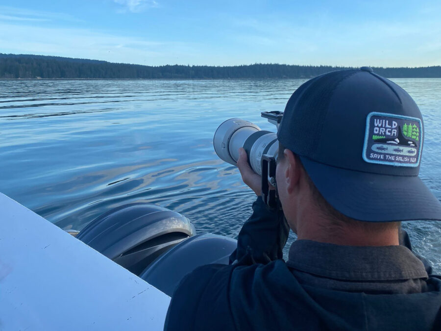 Photographer Derek Nielsen photographing wild orca in the Salish Sea