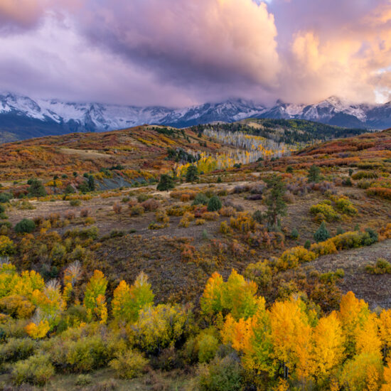 image of the San Juan Mountians during sunset with beautiful fall colors in the trees