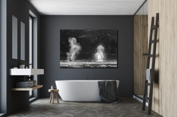 Large unframed fine art print of two orca blowing into the air forming the shapes of horses displayed in the bathroom of a modern home.