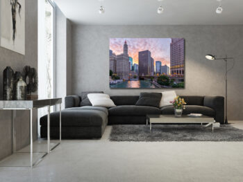 Large unframed fine art print of Chicago's riverfront at sunrise displayed in the living room of a luxury home