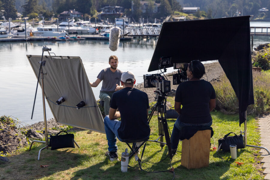 a behind-the-scenes photo of the film crew  filming Forgotten Songs